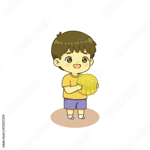 Happy boy holding a mooncake.