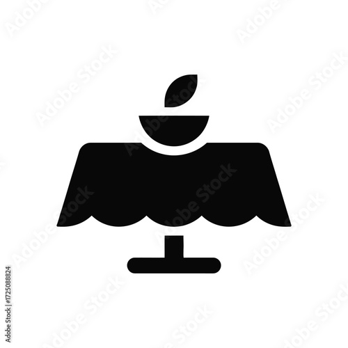 Black Icon Depicting A Table With A Bowl Object On White Background