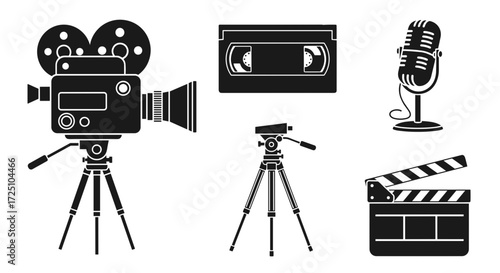 Vintage movie camera, vhs tape, microphone, tripod, and clapperboard