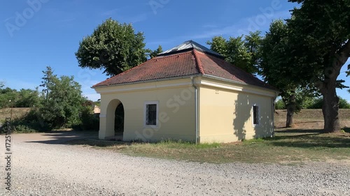 A modern outbuilding surrounded by nature.