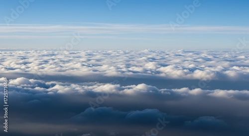 Wallpaper Mural Above the clouds, a sea of white cumulus formations under a clear blue sky Torontodigital.ca