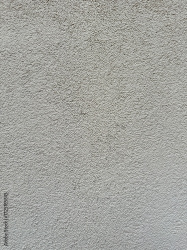 Grey wall background with old grunge or slightly textured surface. Neutral backdrop ideal for design, architecture, interior, and creative projects