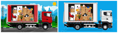 Moving truck with cardboard boxes and furniture. Delivery service and transportation concept. Household goods for relocation.