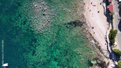 Aerial drone footage of Cala Sisine beach, Sardinia, Italy – turquoise sea and cliffs