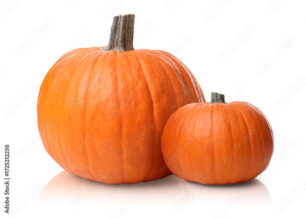 Obraz premium Two fresh orange pumpkins isolated on white