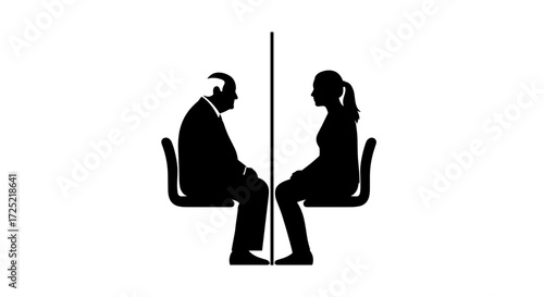 Elderly man sitting opposite his daughter through a barrier at a white background 
