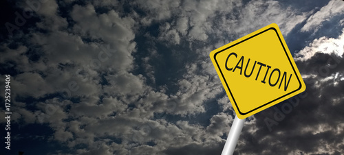 danger,caution,Hurricane Idalia warning sign against a powerful stormy background with copy space. Dirty and angled sign with cyclonic winds add to the drama.hurricane season sign on cloudy background