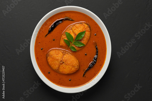 Goa Food - Indian Traditional Goan Pomfret or butter fish curry. Hot and spicy homemade fish gravy cooked using coconut milk and Indian spices.