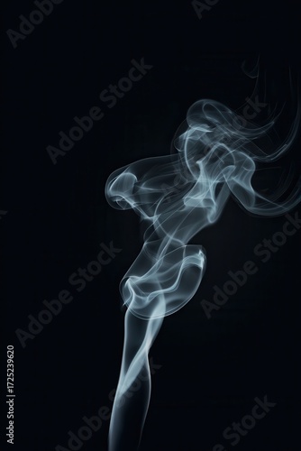 Wallpaper Mural Ethereal smoke forms the silhouette of a graceful figure against a dark background, creating a captivating and artistic visual effect. Torontodigital.ca