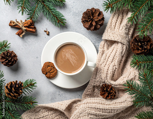 Cozy flat lay with hot chocolate, pinecones, and a knitted scarf during winter Generative AI