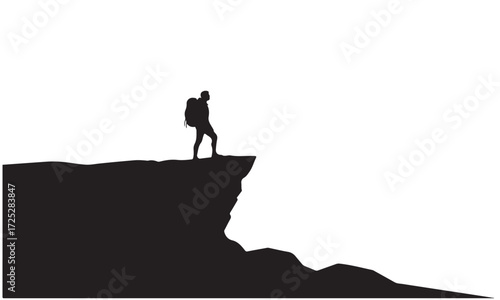 Silhouette of Adventurer Standing on Cliff Edge Overlooking Vista