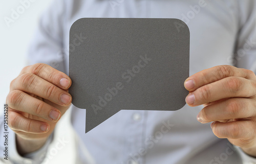 Image of a person holding a...