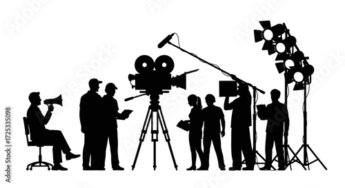 Silhouettes of a dedicated film crew and essential equipment highlight the collaborative and technical aspects of movie production on a bustling set.