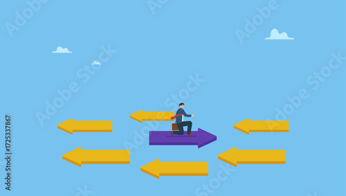 Businessman riding arrow in different direction or other people or mainstream. Contrary investment, be different in opposite direction.