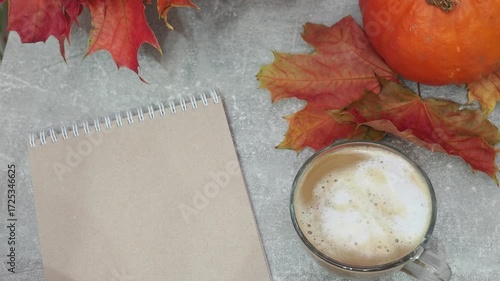 Autumn mood Harvest pumpkin autumn maple leaves red and yellow and coffee sleep Do you want to go to bed little. Thanksgiving and Autumn decoration concept made from autumn leaves and pumpkin
