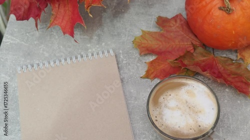 Autumn mood Harvest pumpkin autumn maple leaves red and yellow and coffee sleep Do you want to go to bed little. Thanksgiving and Autumn decoration concept made from autumn leaves and pumpkin