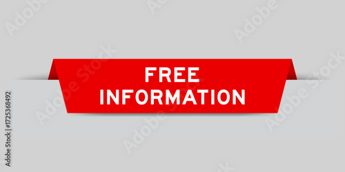 Red color inserted label with word free information on gray background