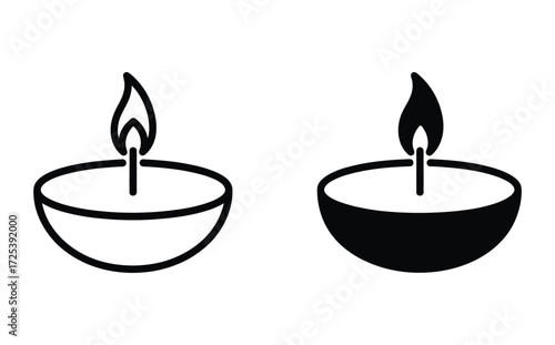 WebClassic oil lamps glow with serene light, perfect for Diwali celebrations, creating a warm and inviting atmosphere in homes and temples, symbolizing hope and prosperity