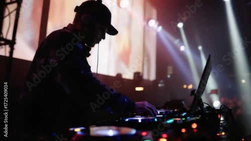 DJ Performing at a Nightclub Event.