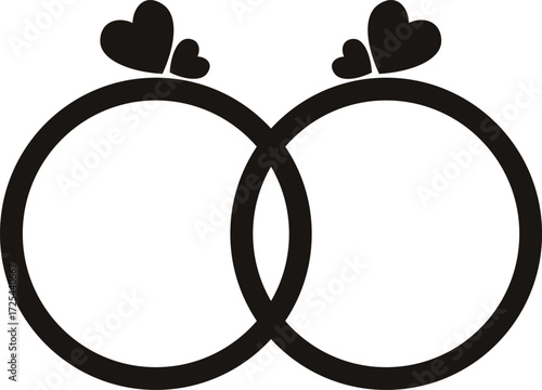 Two wedding rings with hearts, symbolizing love and commitment.