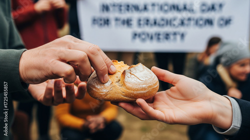 Hands exchanging bread, symbol of charity and poverty alleviation