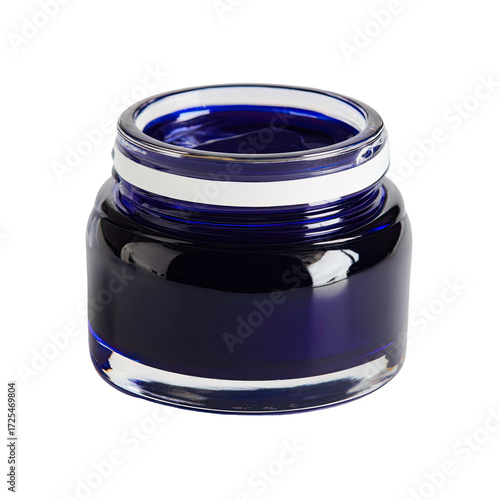 Small, clear glass jar filled with deep blue liquid.  White band around the jar's lip