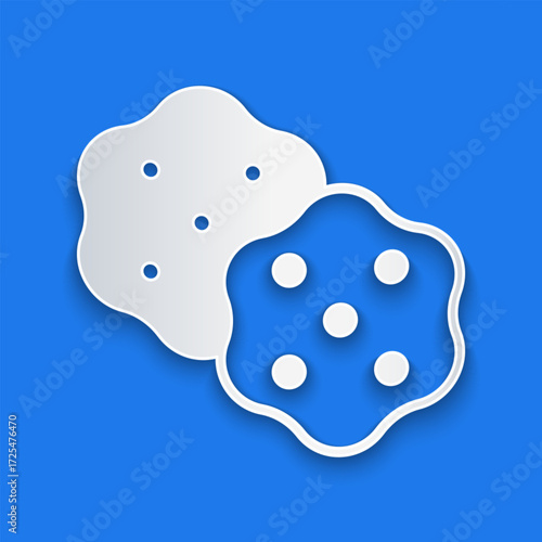 Paper cut Cracker biscuit icon isolated on blue background. Sweet cookie. Paper art style. Vector