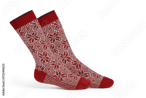 Red and White Snowflake Patterned Winter Socks Isolated on White Background
