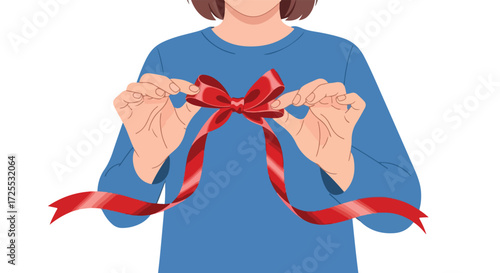 Woman adjusting or tying a vibrant red ribbon into an elegant bow, isolated on a pristine white background, perfect for festive holiday crafting