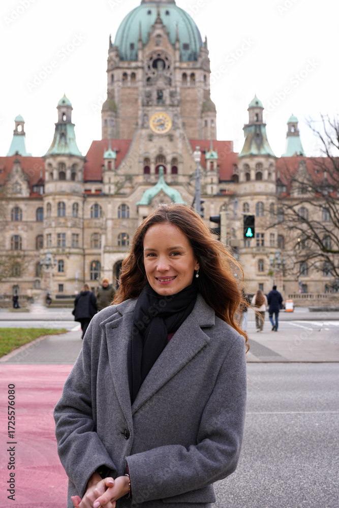Fototapeta premium Portrait of stylish model with heritage architecture