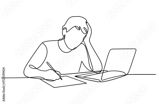 Student studying with laptop and notebook feeling stressed