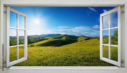 open window view of scenic landscape with green hills and blue sky