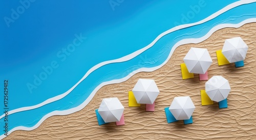 A whimsical overhead view of a sandy beach with stylized blue waves and miniature beach umbrellas and towels.