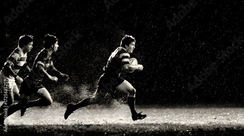 Dramatic Rugby Match in Rain – Black and White Action