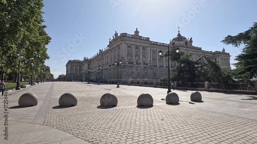 4K video of the Royal Palace of Madrid, Spain, showcasing its grand baroque architecture and historic landmark under clear daylight