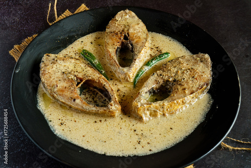 Ilish Macher Noni Bahar | Fusion Bengali Hilsa Curry with Coconut Cream, Black Pepper and Butter | Rich Continental Inspired Ilish Fish Recipe Served with Rice
