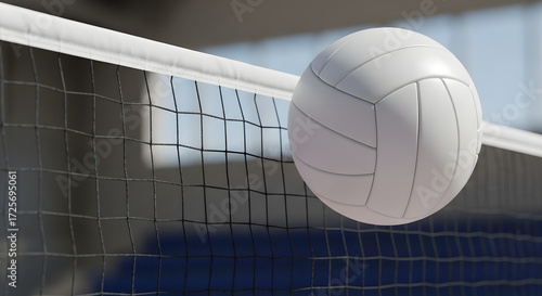 Close-up of a volleyball hitting the net outdoors
