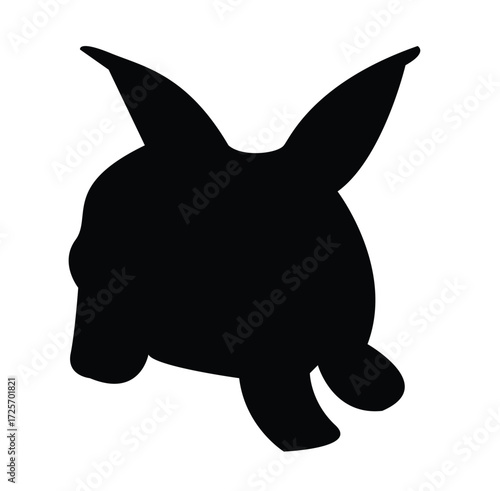 A black silhouette of a rabbit lying down against a white background.