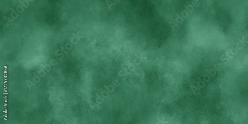 Abstract Elegant dark green background with mottled vintage texture in old fancy background design, texture of colored parchment paper.