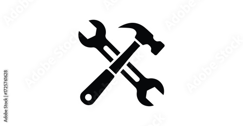 Crossed wrench and hammer icon in black silhouette, symbolizing tools, repair, construction, maintenance, and mechanical functionality