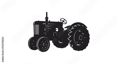 Vintage farm tractor illustration in a striking black and white silhouette