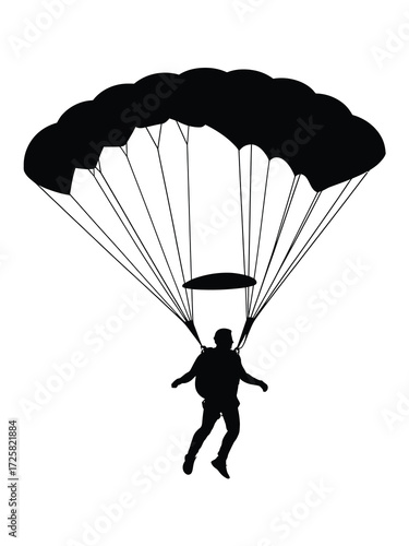 Silhouette of a skydiver descending under a parachute