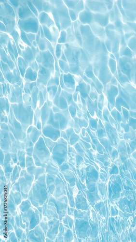 A vast, serene expanse of deep blue water, its surface textured with gentle, overlapping ripples that suggest a soft, continuous motion. The composition is minimalist and balanced, focusing entirely 