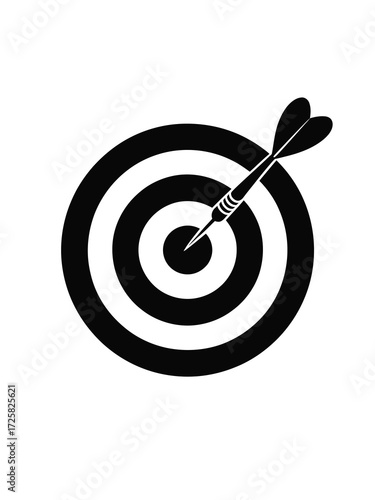 Dart hitting the bullseye on a target board