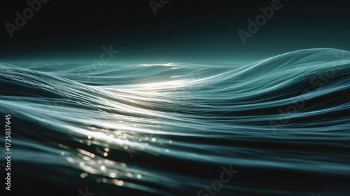 Soft ocean blue caustics sweep slowly across dark water, creating tranquil and mesmerizing seascape at dusk