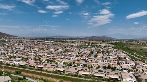 Aerial view of a sprawling neighborhood of family homes in Menifee city in Riverside County, California, United States