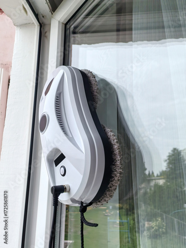 a robot cleaner of windows and walls, modern equipment for cleaning the house.