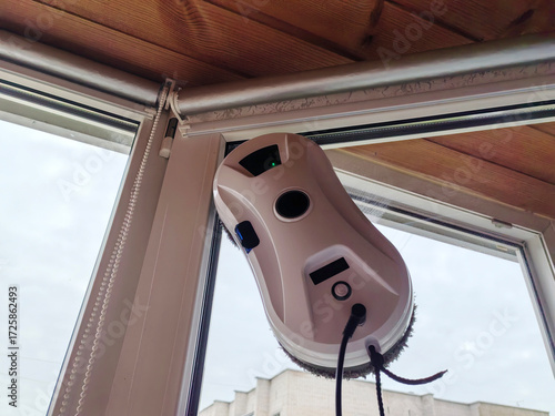 a robot cleaner of windows and walls, modern equipment for cleaning the house.