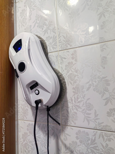 a robot cleaner of windows and walls, modern equipment for cleaning the house.