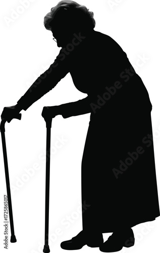 Silhouette of an elderly woman leaning on a walking cane for support